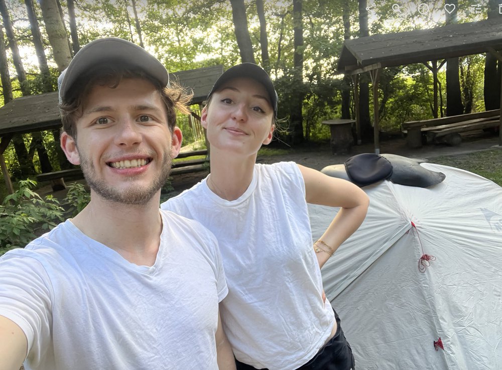 Leonard and Mona camping in a forest